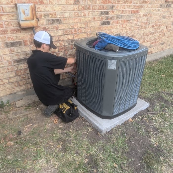Scp Refrigeration Hvac Technician Working On Condenser
